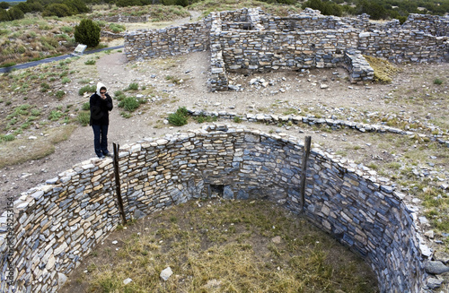 Girl exploring Gran Quivira Ruins photo