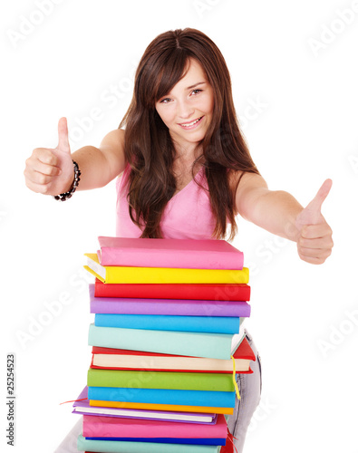 Girl with pile book showing thumb up. Isolated.