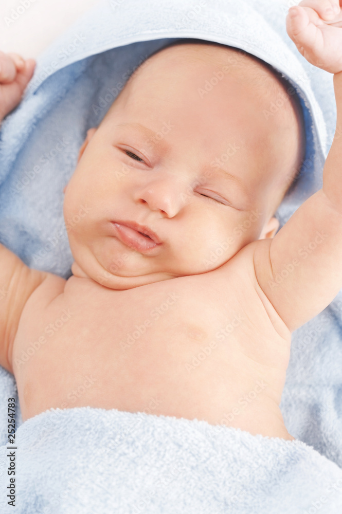The small baby in the bath towel The small baby in the bath towel