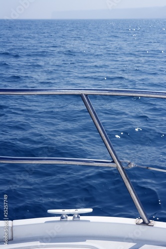marine knot detail on stainless steel boat railing © lunamarina