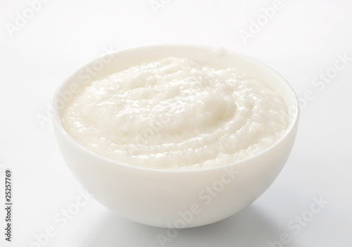 rice porridge in white bowl photo