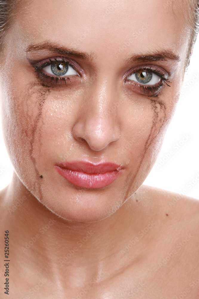 Crying woman with flowing make-up Crying woman with flowing make-up