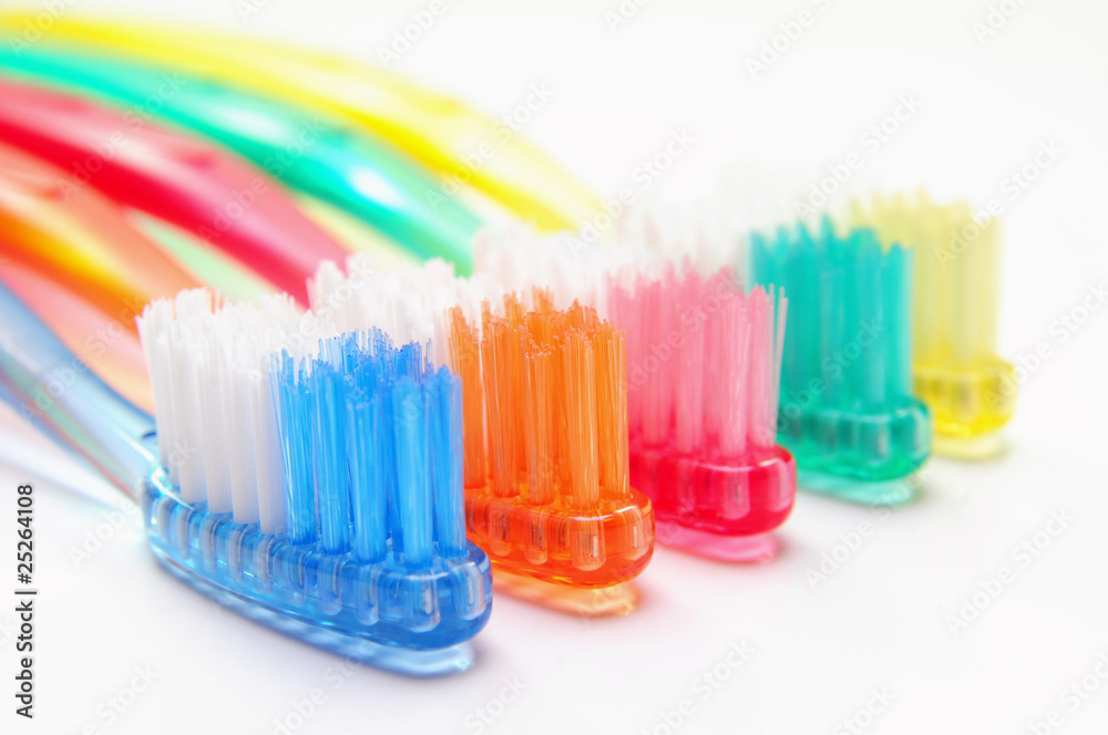 Five colored toothbrushes