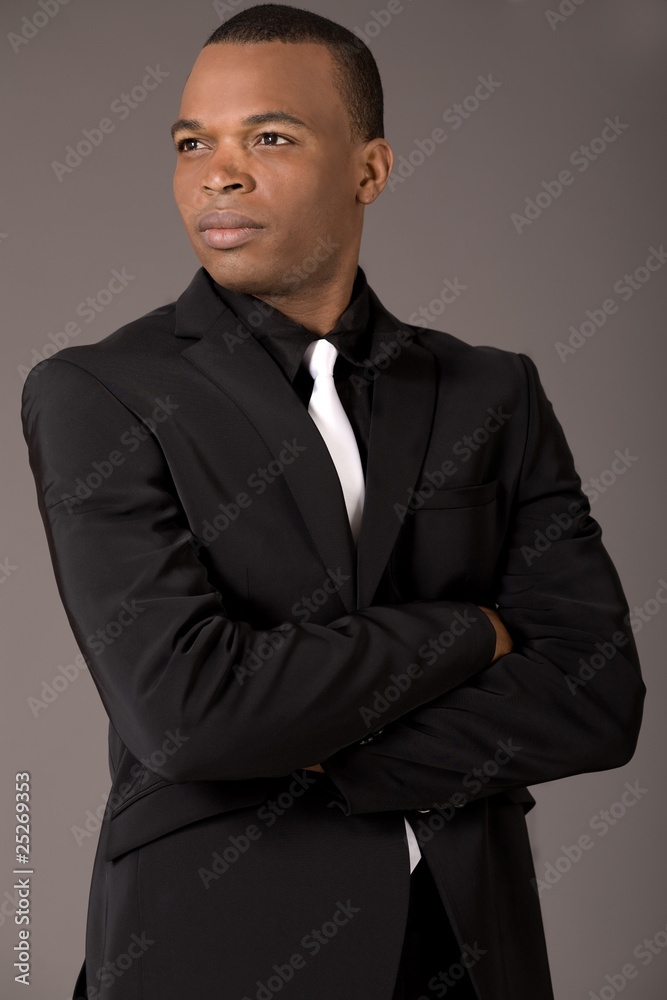 Young black american business man with folded hands Young black american business man with folded hands