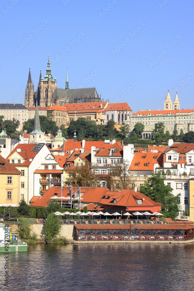 Obraz premium The View on summer Prague gothic Castle above River Vltava