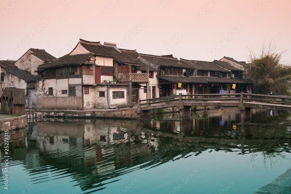 Ancient buildings by the riverside,