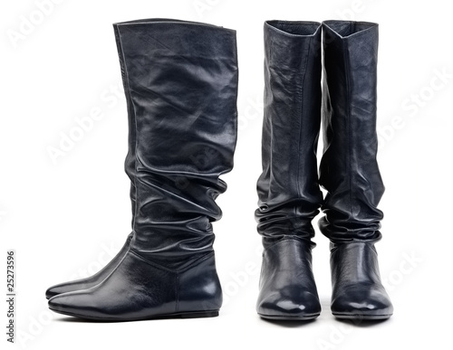 Front and side view of pair of black female boots