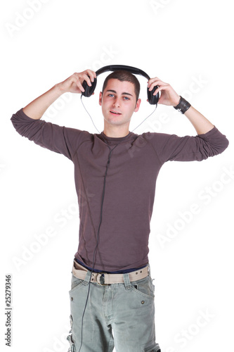 Young man listening music © Netfalls