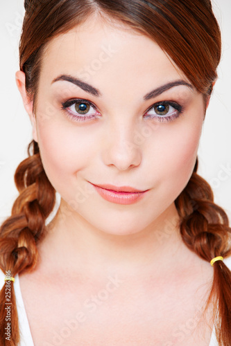 pretty girl with two pigtails