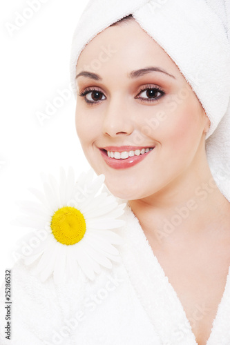 woman with camomile over white background