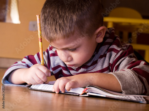 Canvastavla bambino che scrive