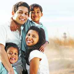 Happy family enjoying summer vacation portrait