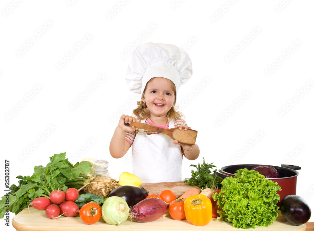 Happy little chef with lots of vegetables Happy little chef with lots of vegetables
