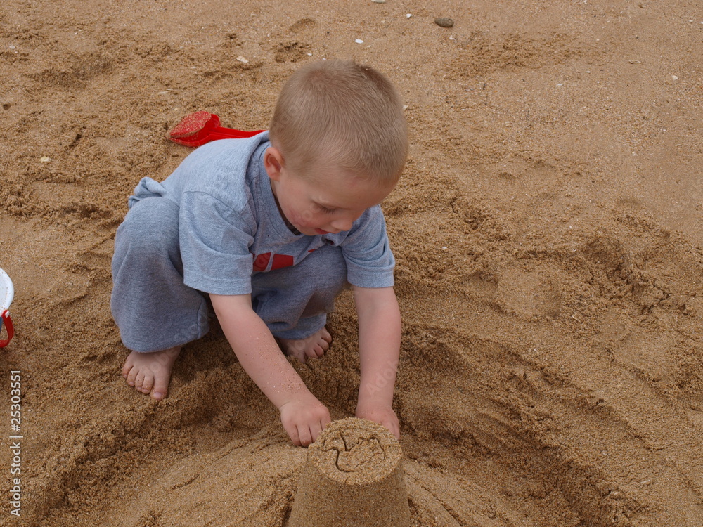 child playing on the beach child playing on the beach