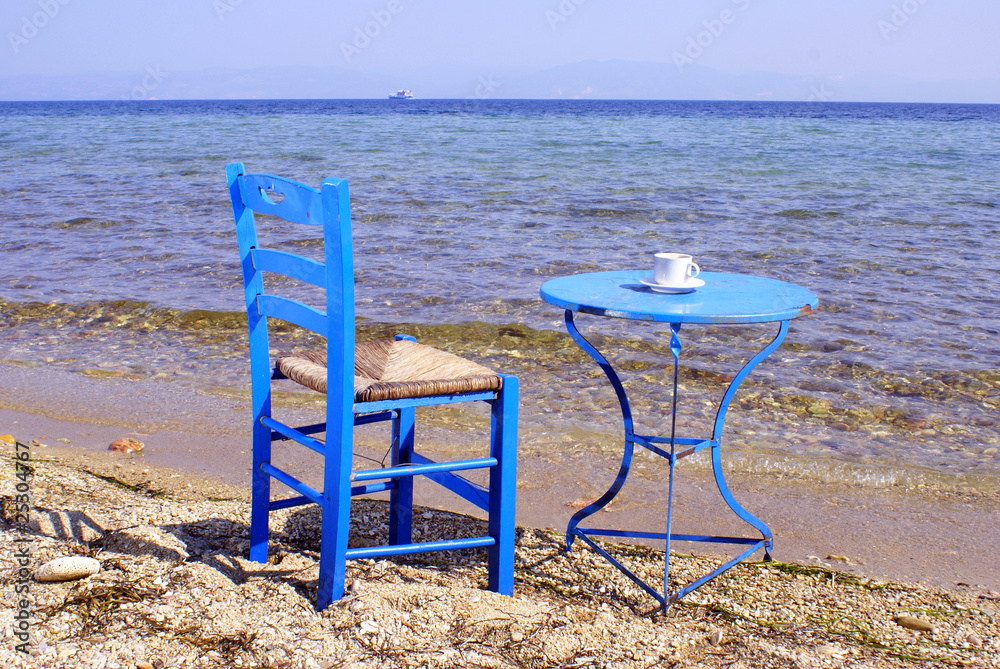 Greek traditional table and chair on the beach