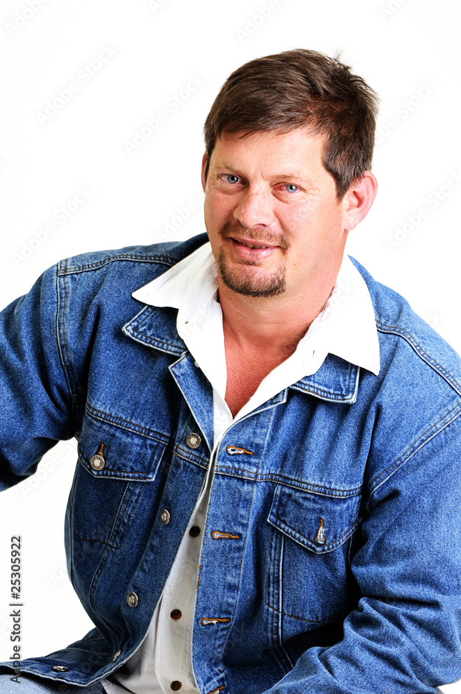 portrait of handsome male model with beard and smiling portrait of handsome male model with beard and smiling