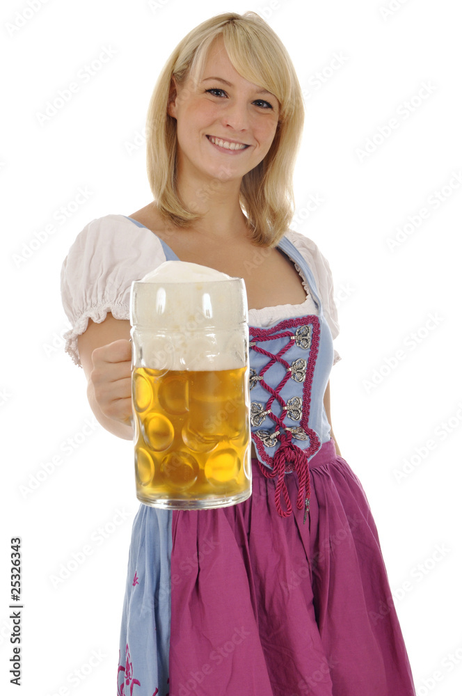 Junge Frau im Dirndl mit Maßkrug Bier Junge Frau im Dirndl mit Maßkrug Bier