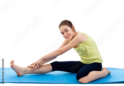 Active girl exercising isolated on white background