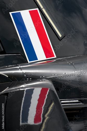 netherlands flag and reflection on an aircraft panel