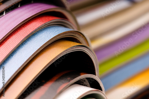 Stack of open magazines