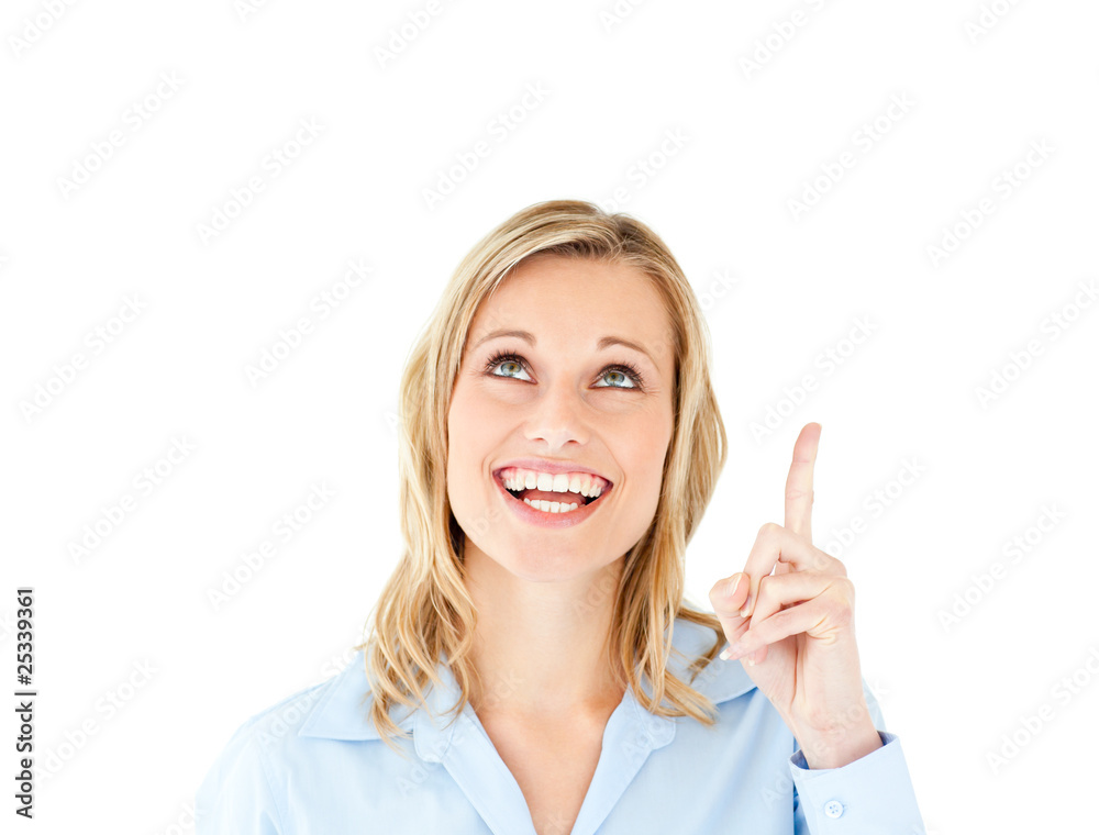 Jolly young woman pointing upward isolated Jolly young woman pointing upward isolated
