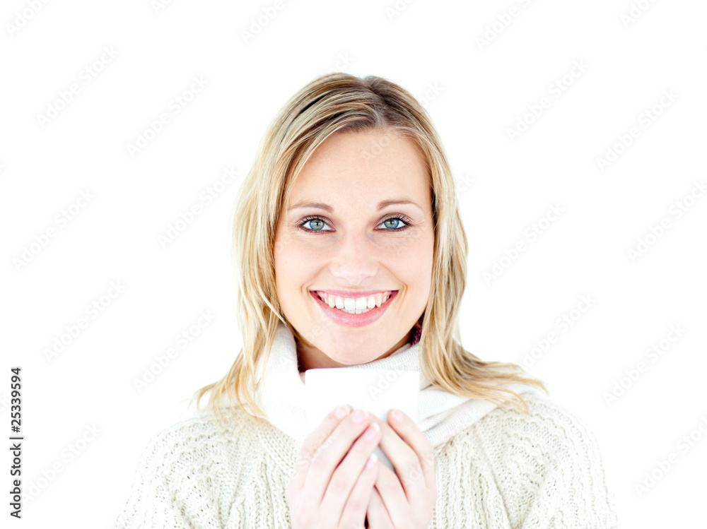 Smiling woman wearing a pullover enjoying a hot coffee Smiling woman wearing a pullover enjoying a hot coffee