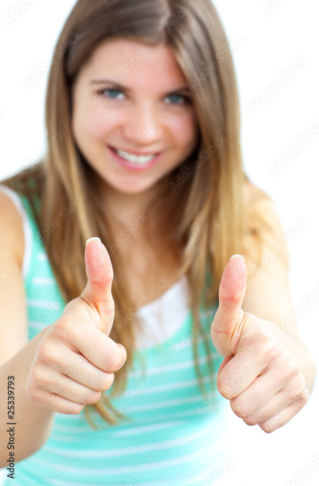 Young caucasian woman with her thumbs up to the camera Young caucasian woman with her thumbs up to the camera