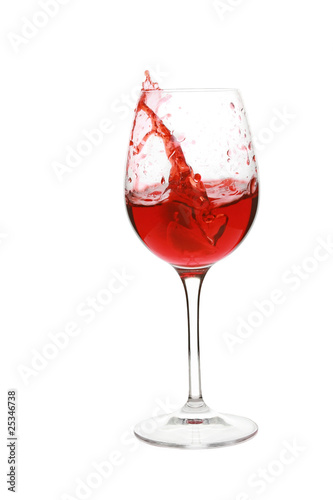 Pouring red wine in glass