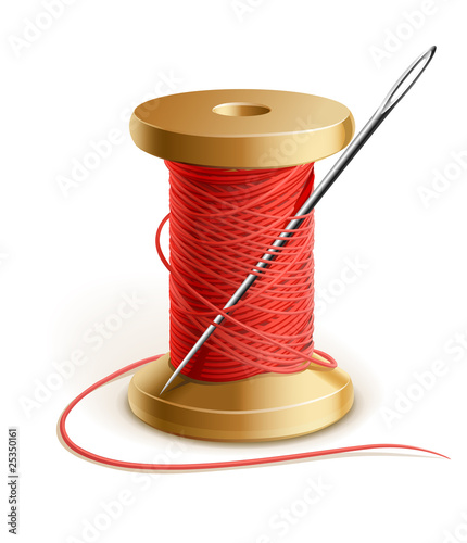 reel with thread and needle
