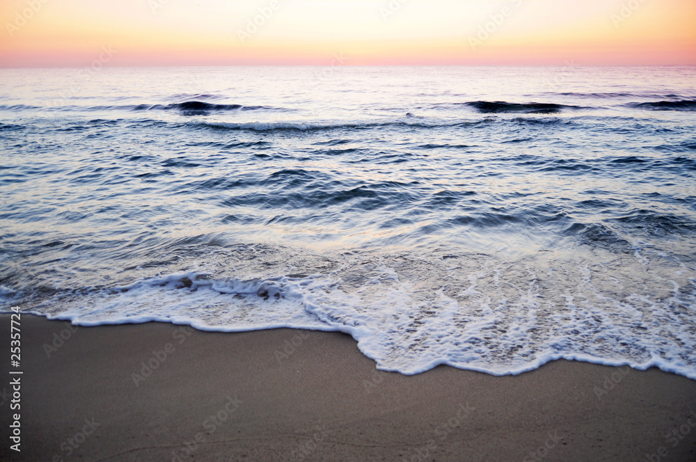 Waves shplashing at dawn