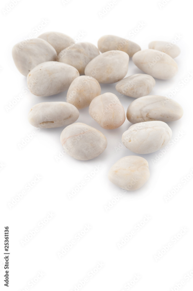 White stones on white background
