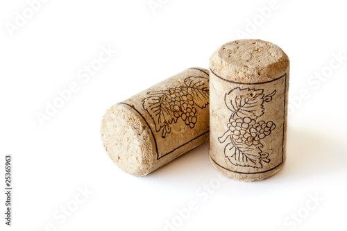 Two wine corks isolated on white background