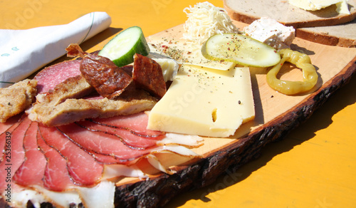 Brotzeitbrett mit Speck und Käse photo