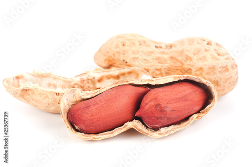 Macro of an opened peanut isolated on white background