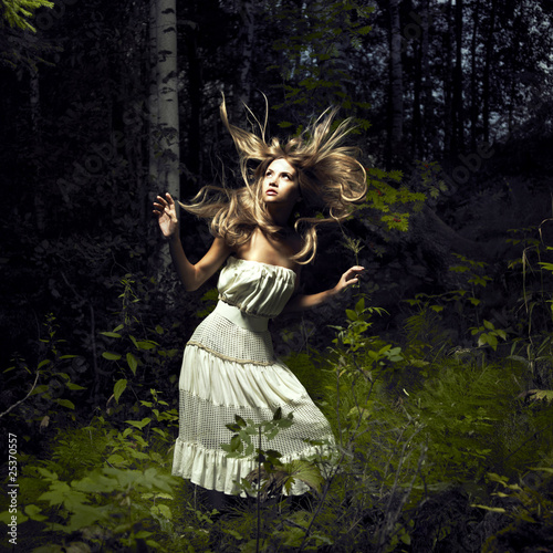 Girl in fairy forest photo