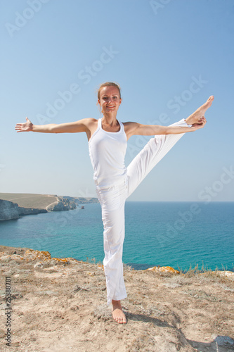 Woman practices Yoga