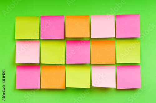 Reminder notes on the bright colorful paper © Elnur