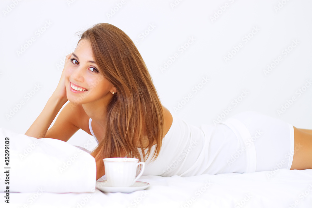 Beautiful girl lying on the bed Beautiful girl lying on the bed