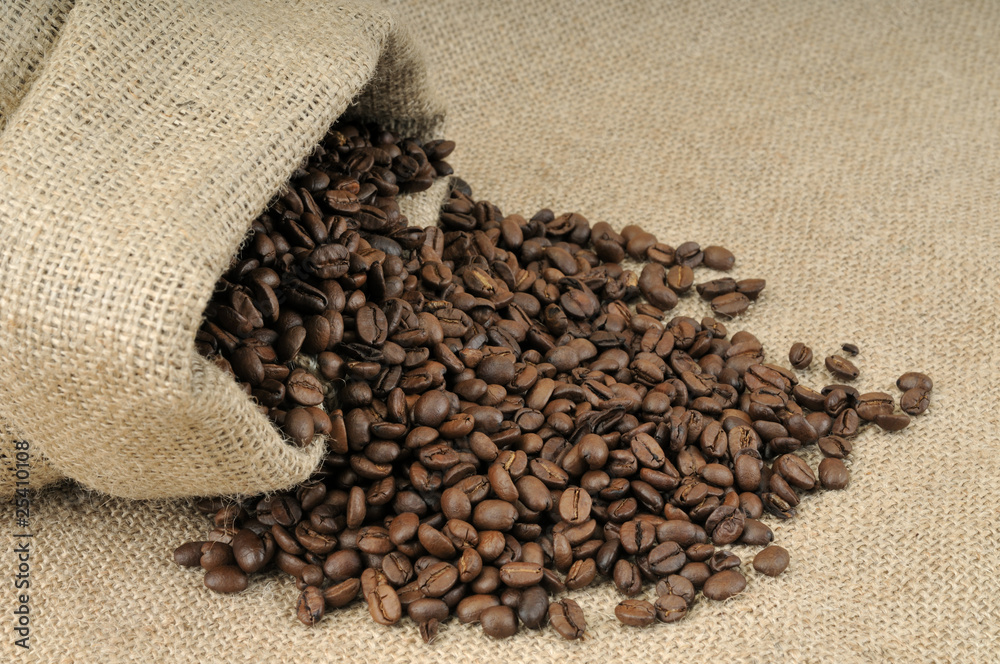 Coffee beans in canvas sack with copy space. Coffee beans in canvas sack with copy space.