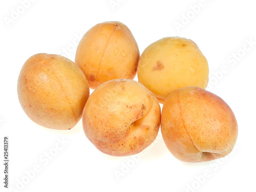 Five of apricots on a white background