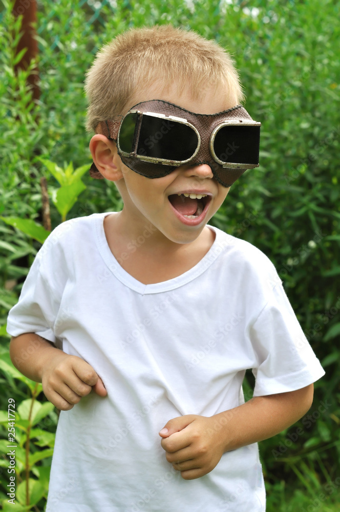 boy with glasses outdoors boy with glasses outdoors