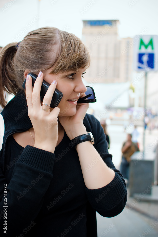 young girl talking on the phone