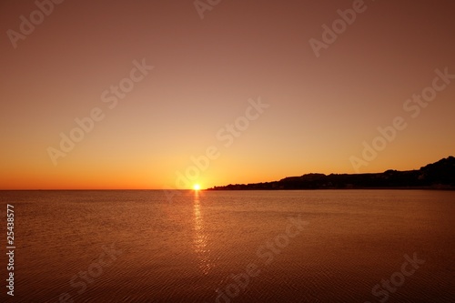 sunset on sea water ocean horizon in Mediterranean