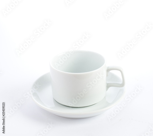 cup on plate on white background