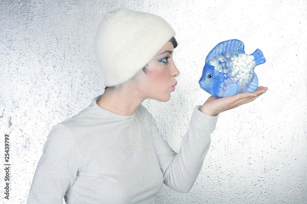 woman profile holding fish kissing expression woman profile holding fish kissing expression