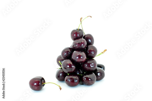 cherries piled up and isolated on white