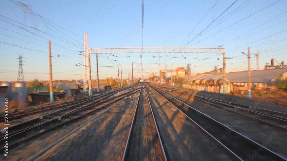 camera moving on rails past railway station camera moving on rails past railway station
