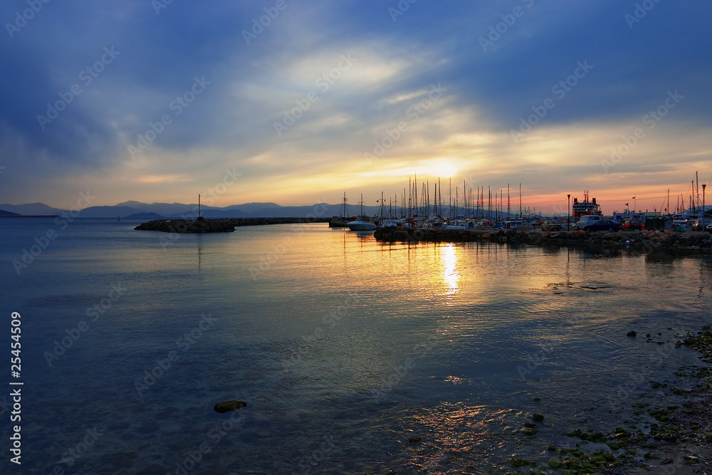 Sunset in the harbor of the Aegina island, Greece