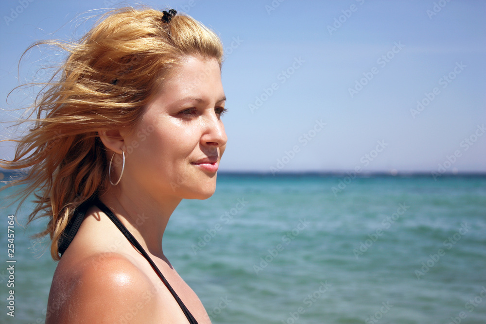 Beautiful self-confidence woman on the beach Beautiful self-confidence woman on the beach