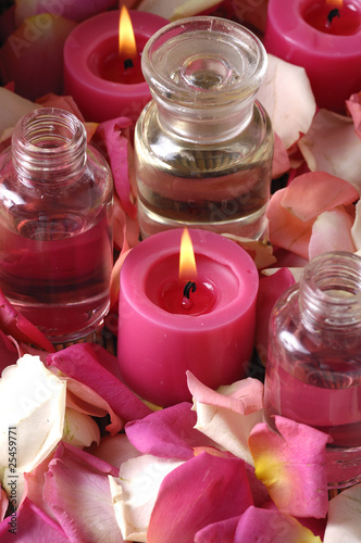 Spa background of oil and candle on bamboo mat